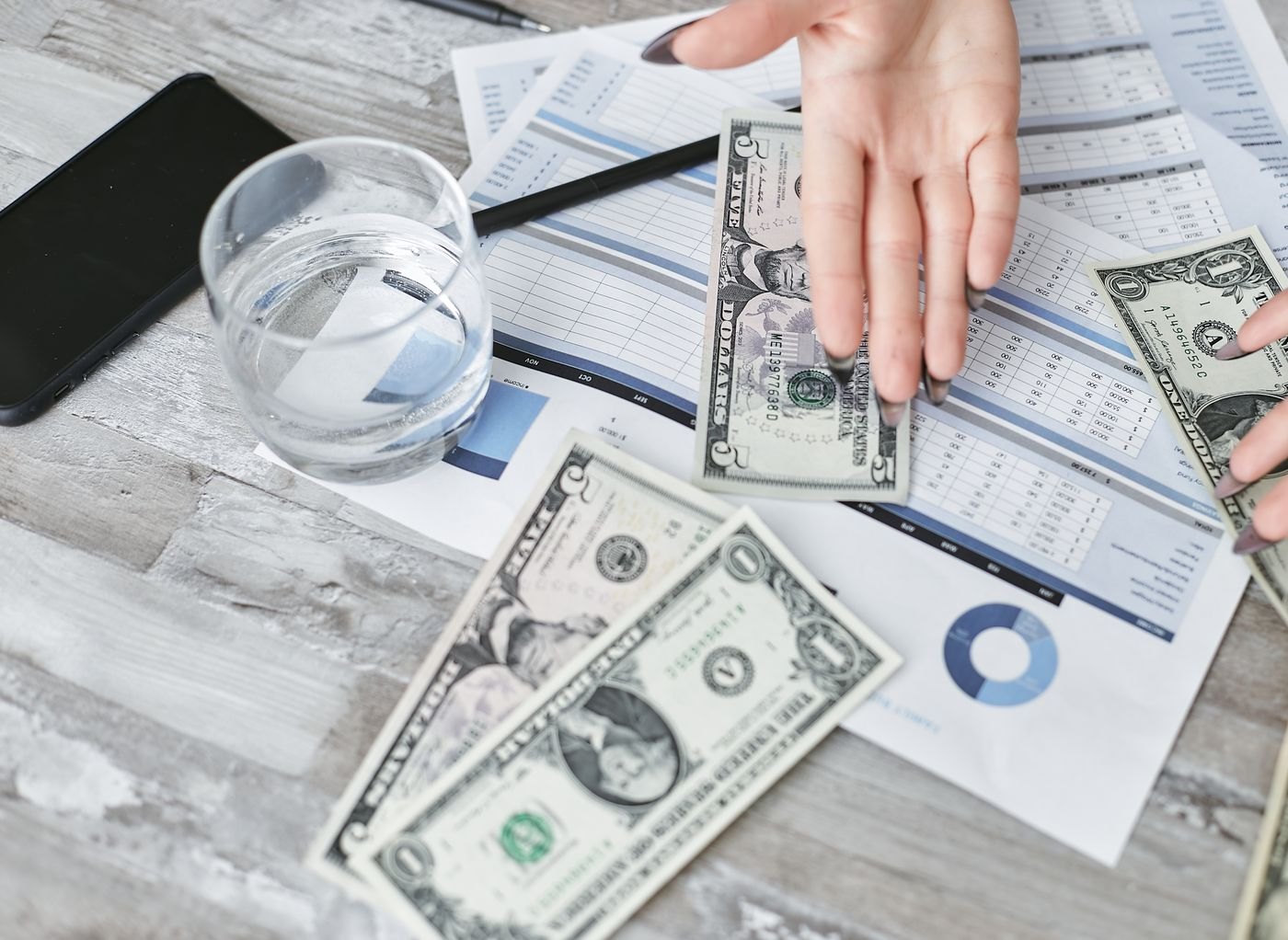 Money and a financial document on a table
