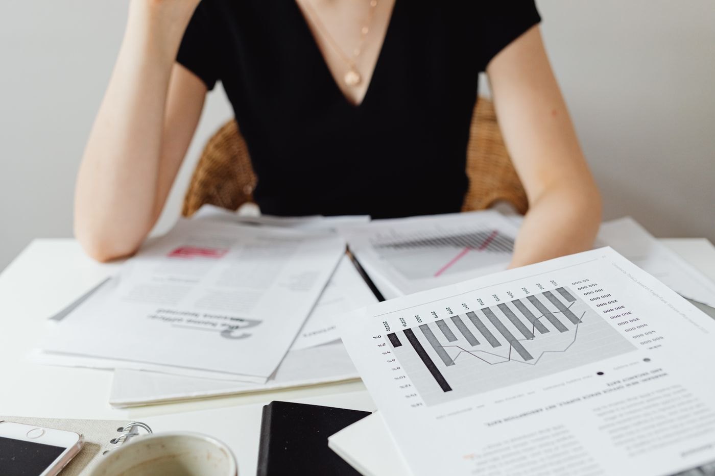 Printed accounting charts being reviewed