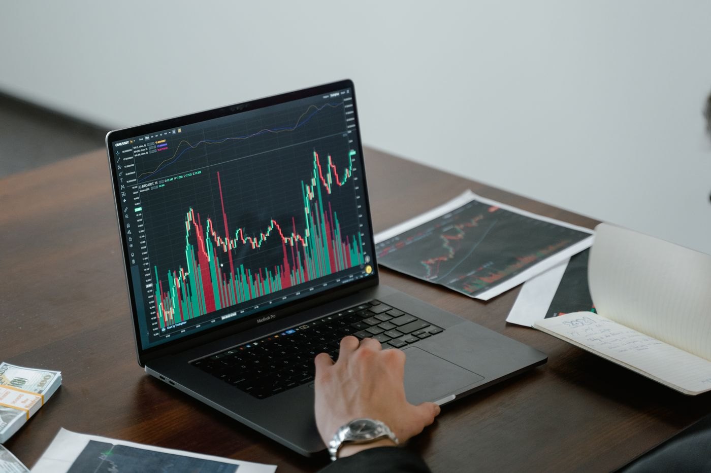 A price graph displayed on a laptop screen