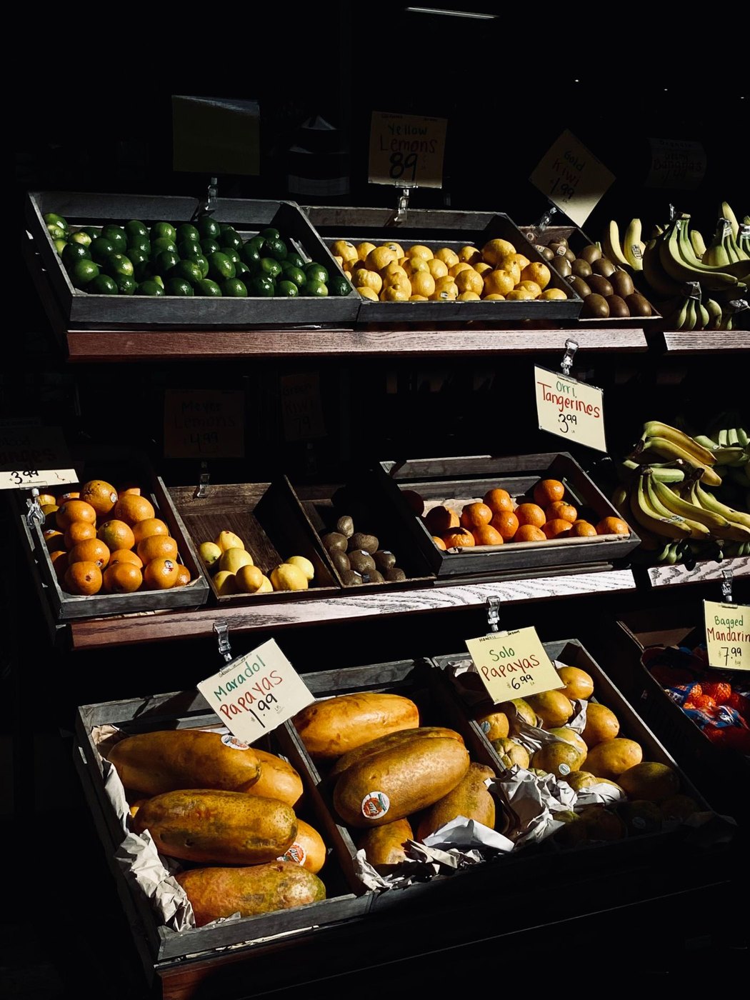 Market produce displayed with price labels